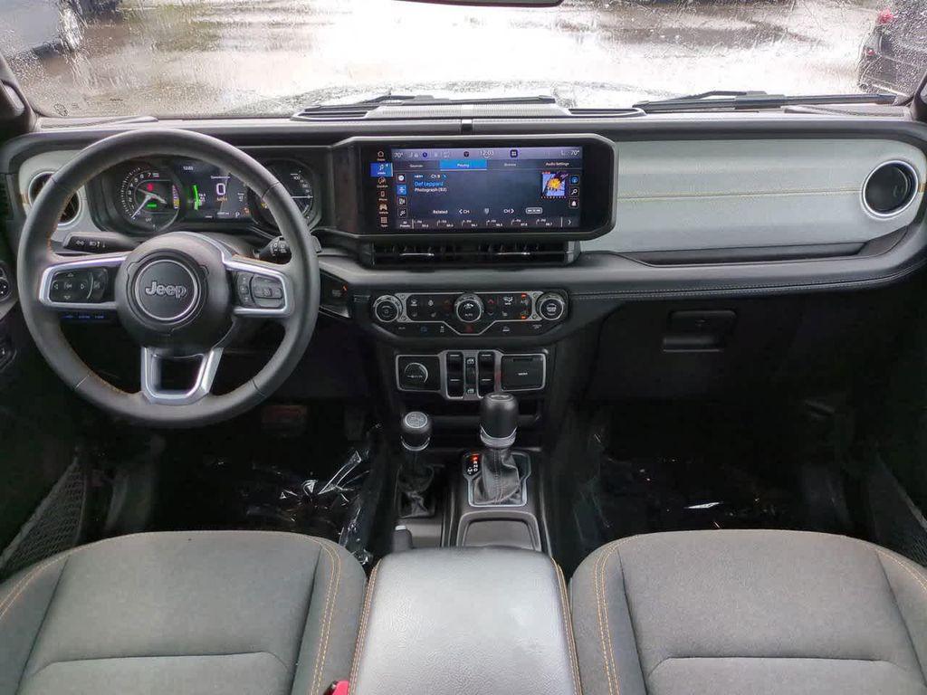 used 2024 Jeep Wrangler 4xe car, priced at $37,392