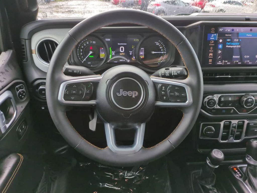used 2024 Jeep Wrangler 4xe car, priced at $37,392
