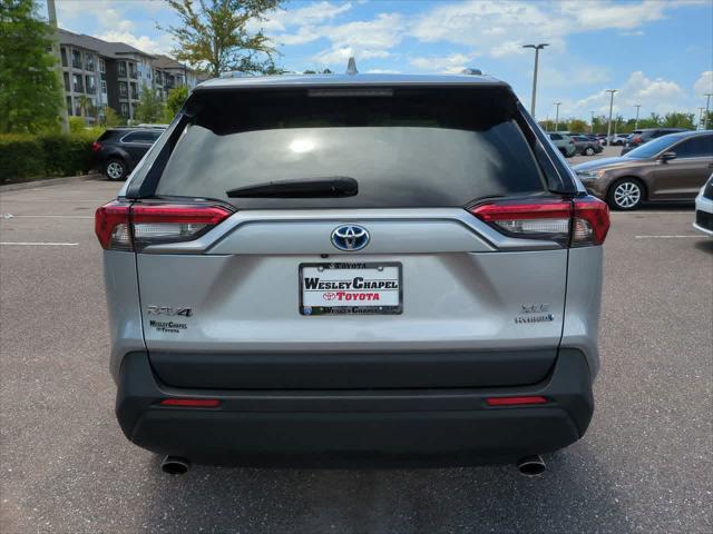 used 2024 Toyota RAV4 Hybrid car, priced at $31,044