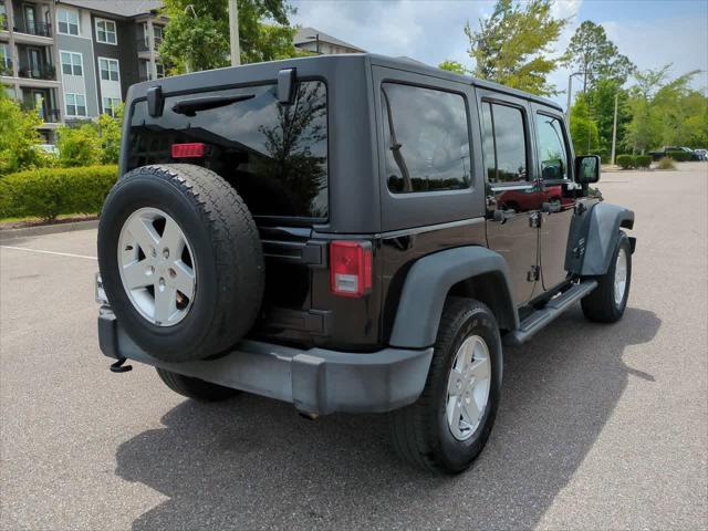 used 2016 Jeep Wrangler Unlimited car, priced at $13,999
