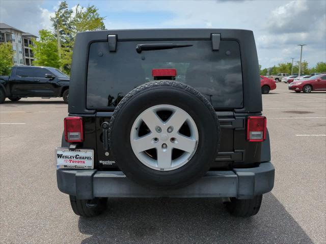 used 2016 Jeep Wrangler Unlimited car, priced at $13,999