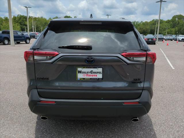 used 2024 Toyota RAV4 Hybrid car, priced at $32,214