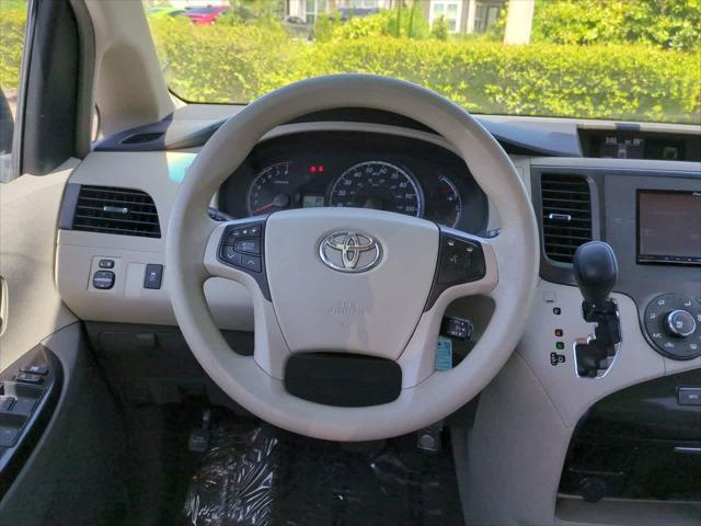 used 2011 Toyota Sienna car, priced at $9,999
