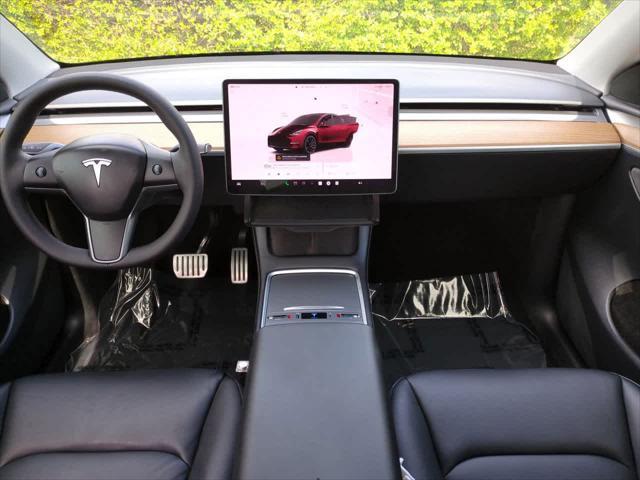 used 2022 Tesla Model Y car, priced at $27,999