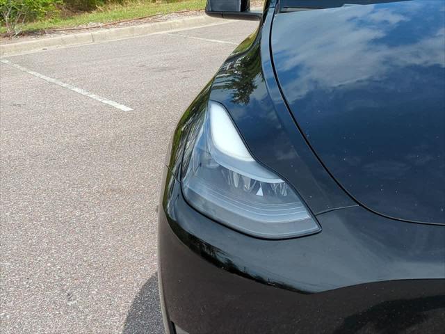 used 2022 Tesla Model Y car, priced at $27,999