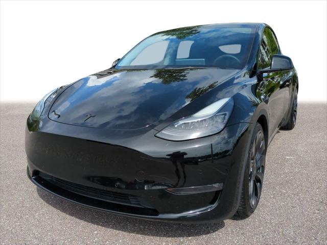 used 2022 Tesla Model Y car, priced at $27,999