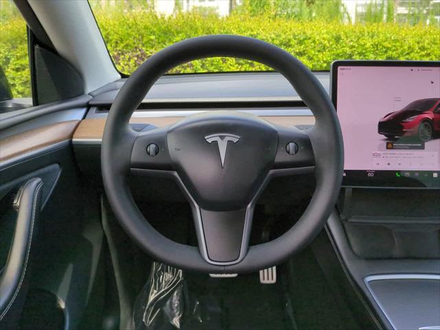 used 2022 Tesla Model Y car, priced at $27,999