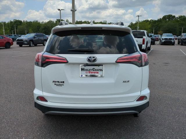 used 2018 Toyota RAV4 car, priced at $19,744