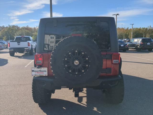 used 2011 Jeep Wrangler Unlimited car, priced at $15,999