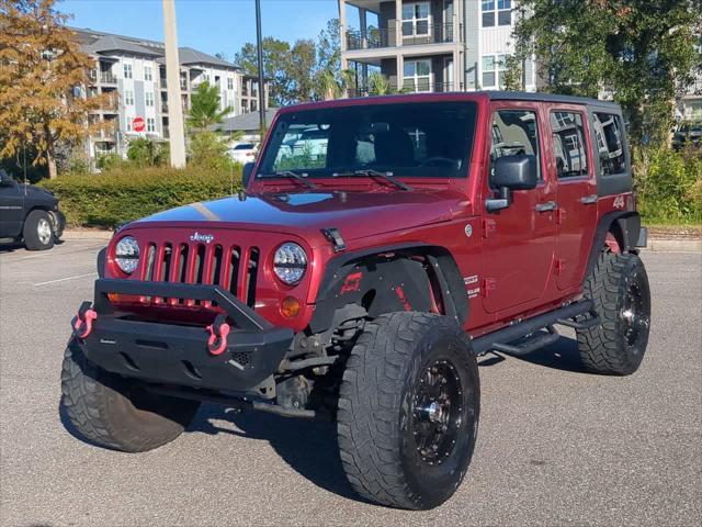 used 2011 Jeep Wrangler Unlimited car, priced at $15,999