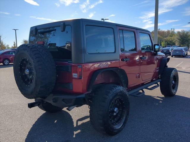 used 2011 Jeep Wrangler Unlimited car, priced at $15,999