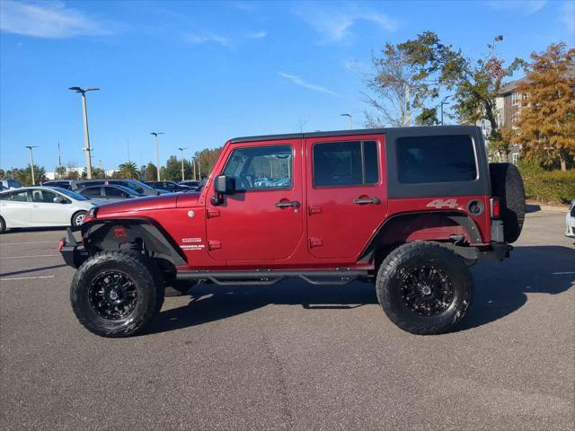 used 2011 Jeep Wrangler Unlimited car, priced at $15,999