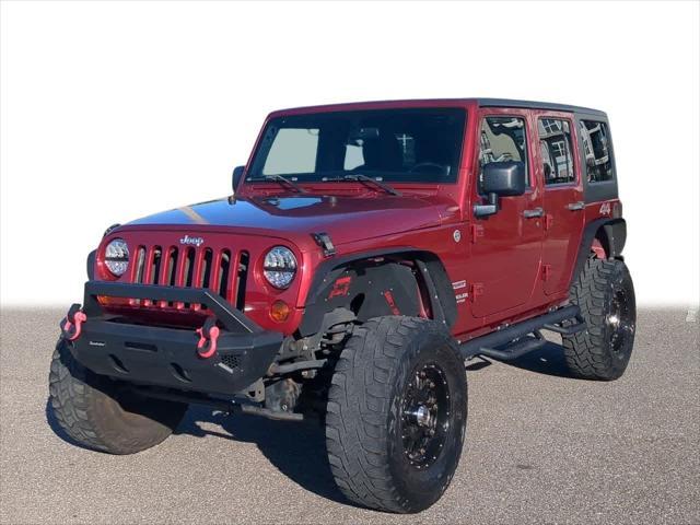 used 2011 Jeep Wrangler Unlimited car, priced at $15,999