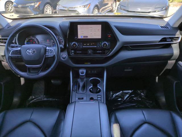 used 2023 Toyota Highlander Hybrid car, priced at $38,444