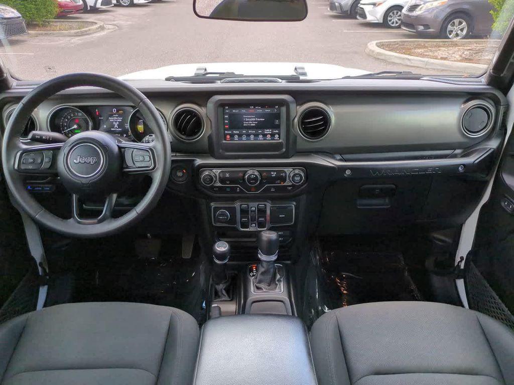 used 2023 Jeep Wrangler 4xe car, priced at $25,444