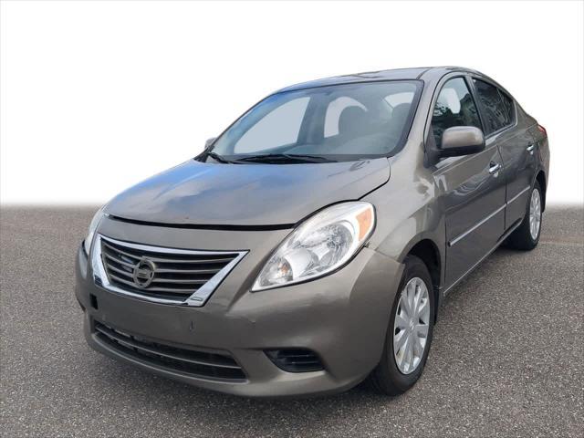 used 2013 Nissan Versa car, priced at $3,999