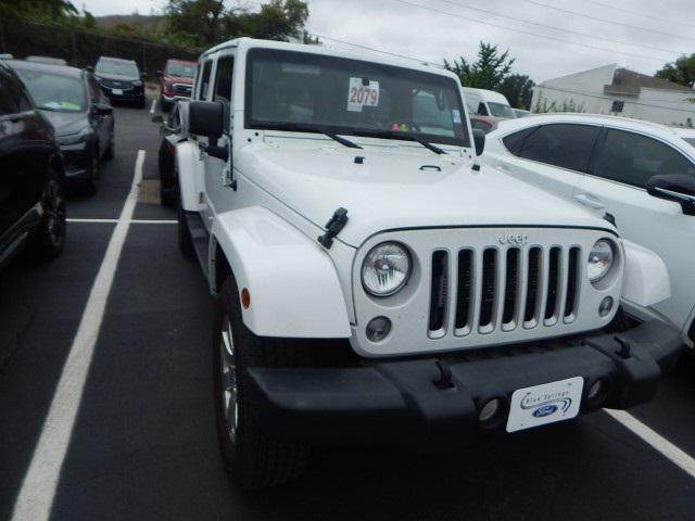 used 2018 Jeep Wrangler JK Unlimited car, priced at $19,497