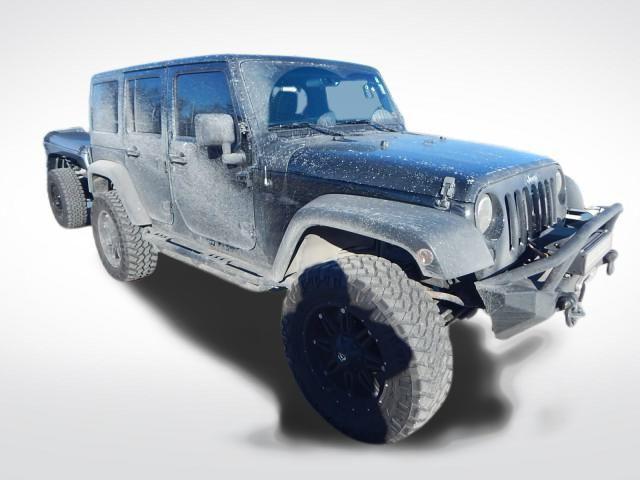 used 2011 Jeep Wrangler Unlimited car, priced at $16,497