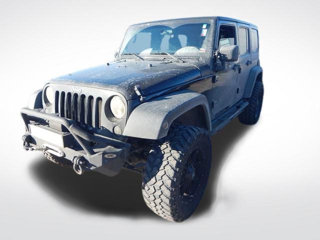 used 2011 Jeep Wrangler Unlimited car, priced at $16,479