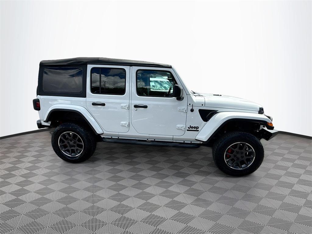 used 2021 Jeep Wrangler Unlimited car, priced at $25,131