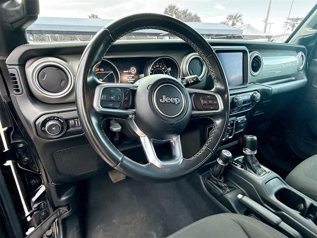 used 2022 Jeep Wrangler Unlimited car, priced at $24,497