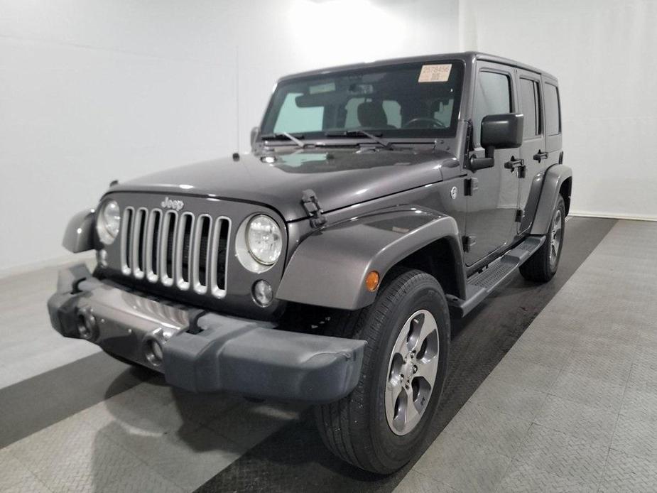 used 2016 Jeep Wrangler Unlimited car, priced at $22,429