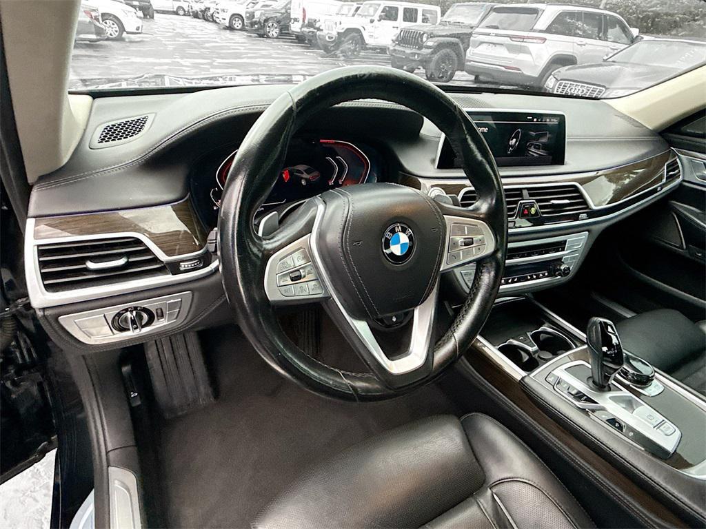 used 2022 BMW 750 car, priced at $49,321