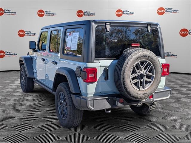 used 2024 Jeep Wrangler car, priced at $38,998