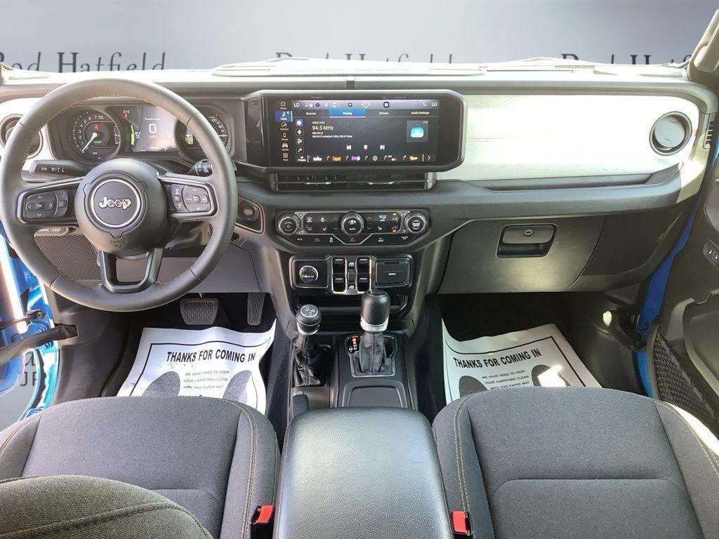 used 2024 Jeep Wrangler 4xe car, priced at $33,688