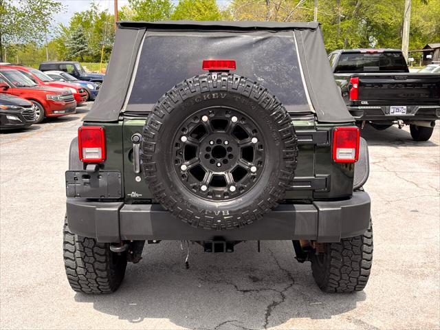 used 2010 Jeep Wrangler Unlimited car, priced at $13,995