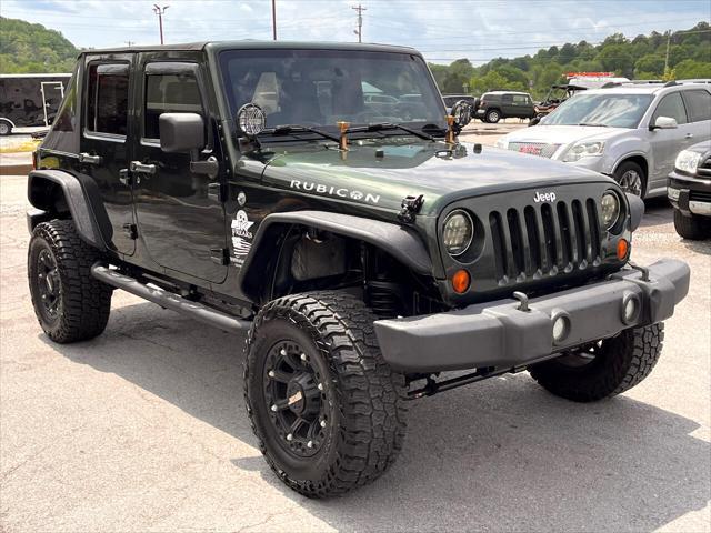 used 2010 Jeep Wrangler Unlimited car, priced at $13,995