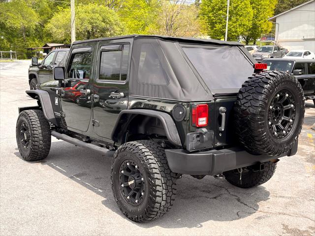 used 2010 Jeep Wrangler Unlimited car, priced at $13,995