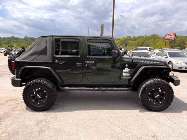 used 2010 Jeep Wrangler Unlimited car, priced at $13,995