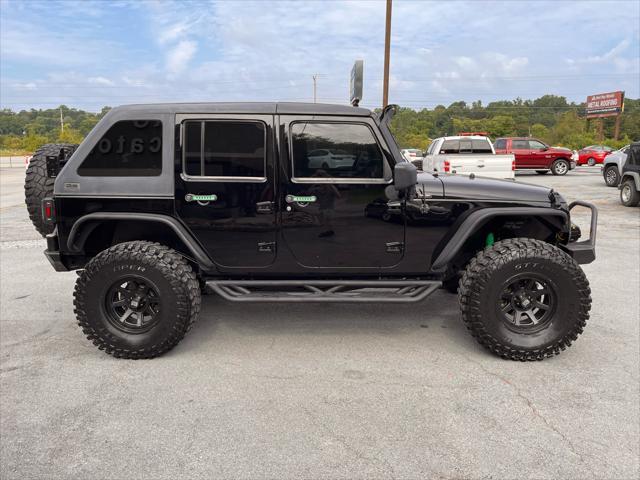 used 2012 Jeep Wrangler Unlimited car, priced at $14,995