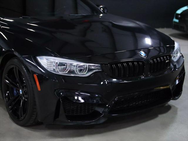 used 2015 BMW M4 car, priced at $32,998