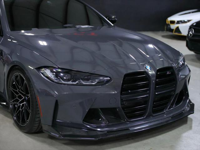 used 2022 BMW M4 car, priced at $61,998