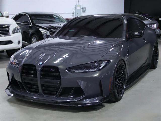 used 2022 BMW M4 car, priced at $61,998