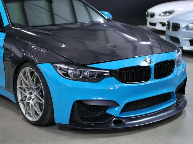 used 2018 BMW M4 car, priced at $29,998