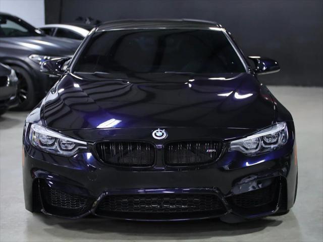 used 2018 BMW M4 car, priced at $34,998