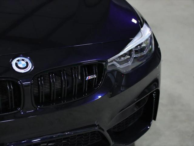 used 2018 BMW M4 car, priced at $34,998