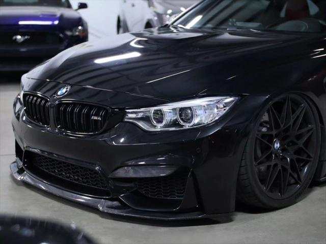 used 2015 BMW M4 car, priced at $33,998