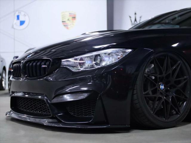 used 2015 BMW M4 car, priced at $33,998