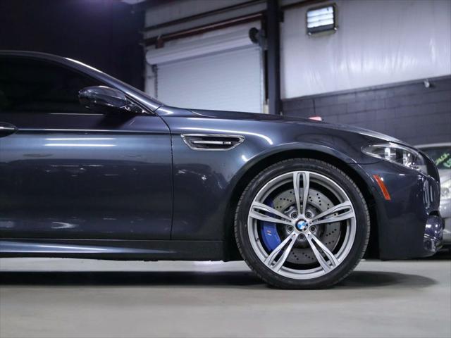 used 2014 BMW M5 car, priced at $26,998