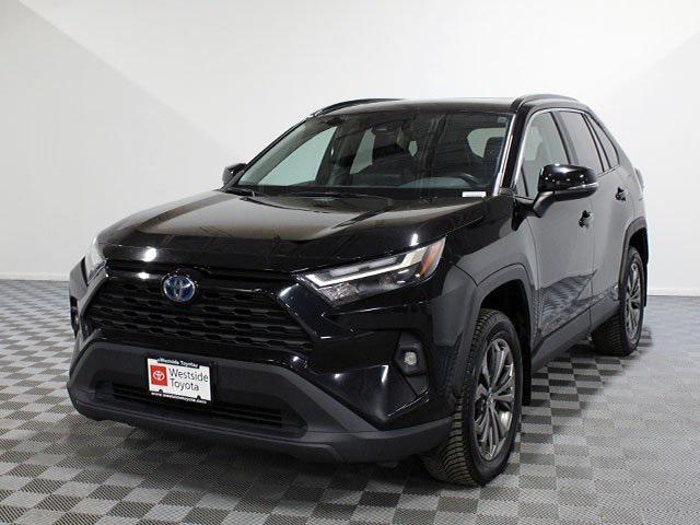 used 2022 Toyota RAV4 Hybrid car, priced at $28,000