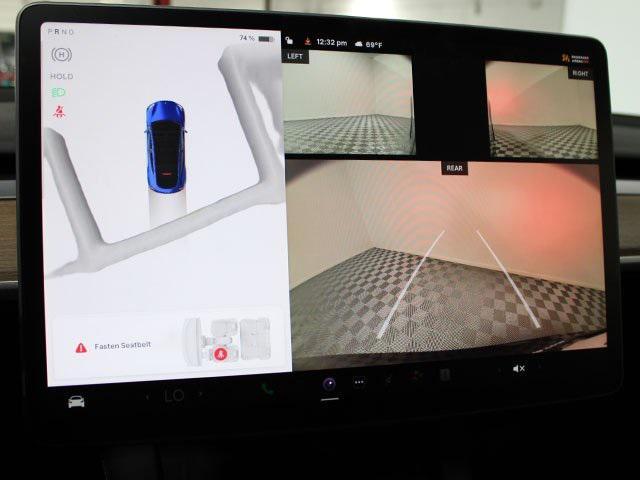 used 2024 Tesla Model Y car, priced at $33,000