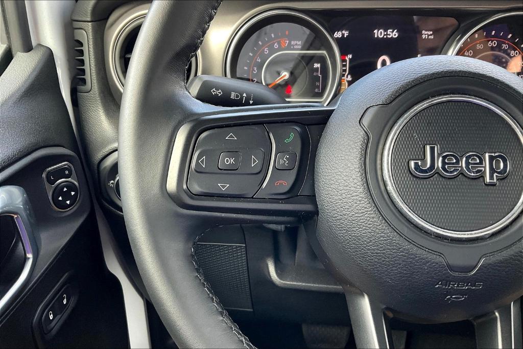 used 2021 Jeep Wrangler Unlimited car, priced at $25,748