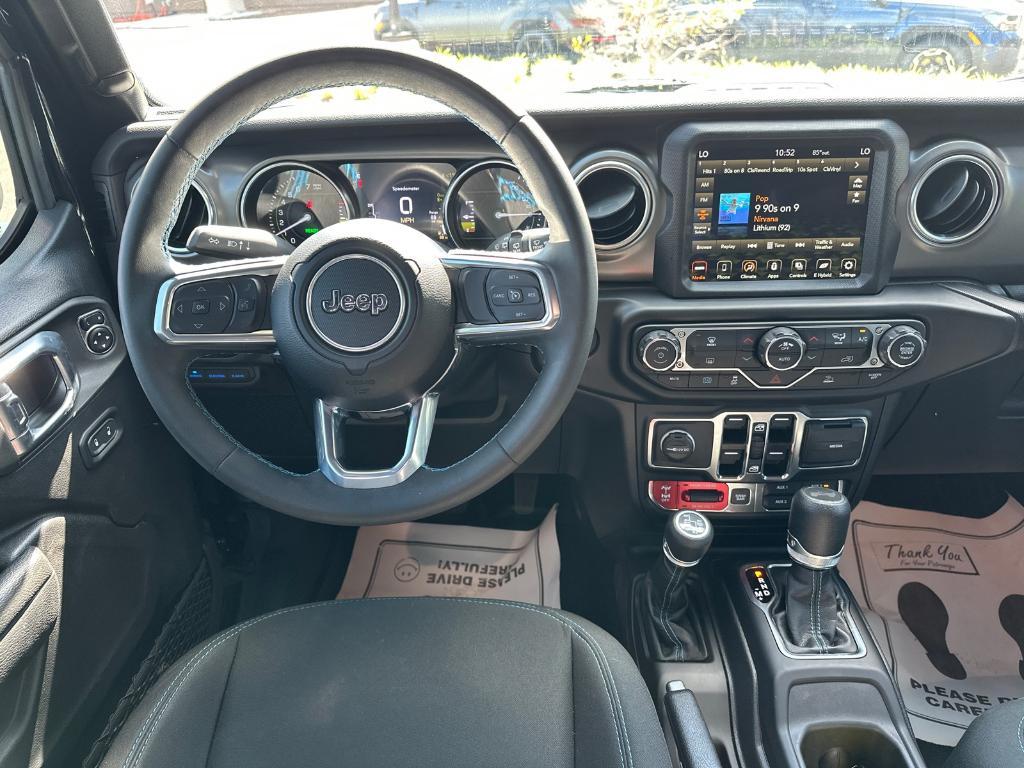 used 2023 Jeep Wrangler 4xe car, priced at $37,871