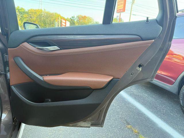 used 2013 BMW X1 car, priced at $7,495