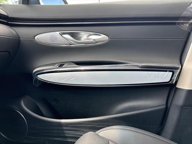 used 2025 Genesis GV70 car, priced at $43,889