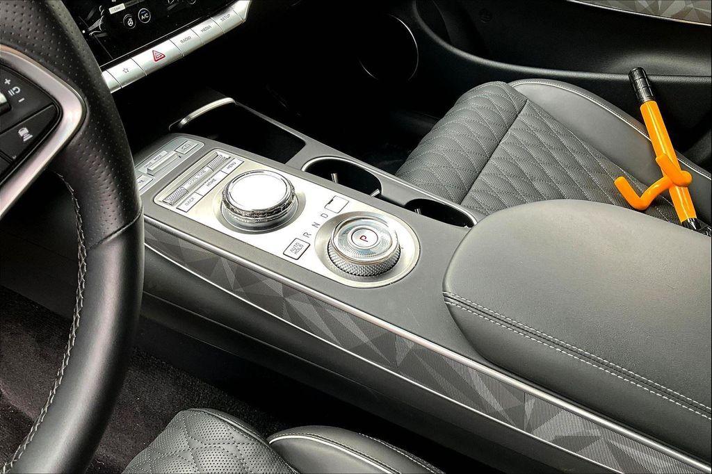 used 2025 Genesis GV70 car, priced at $56,495